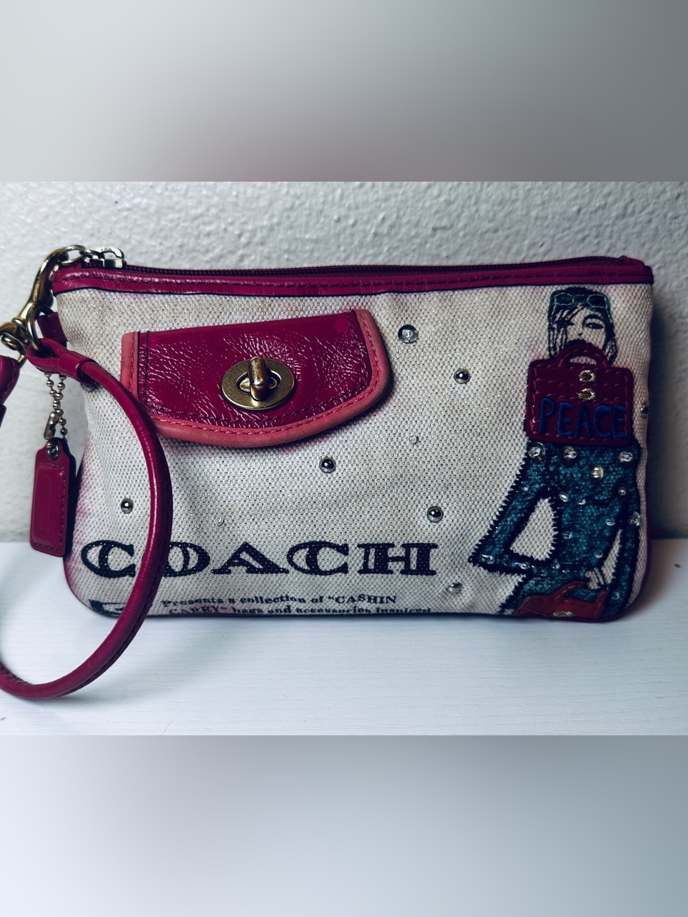 2009 Coach Bonnie Cashin PEACE LADY Applique Graphic Print Canvas Wristlet